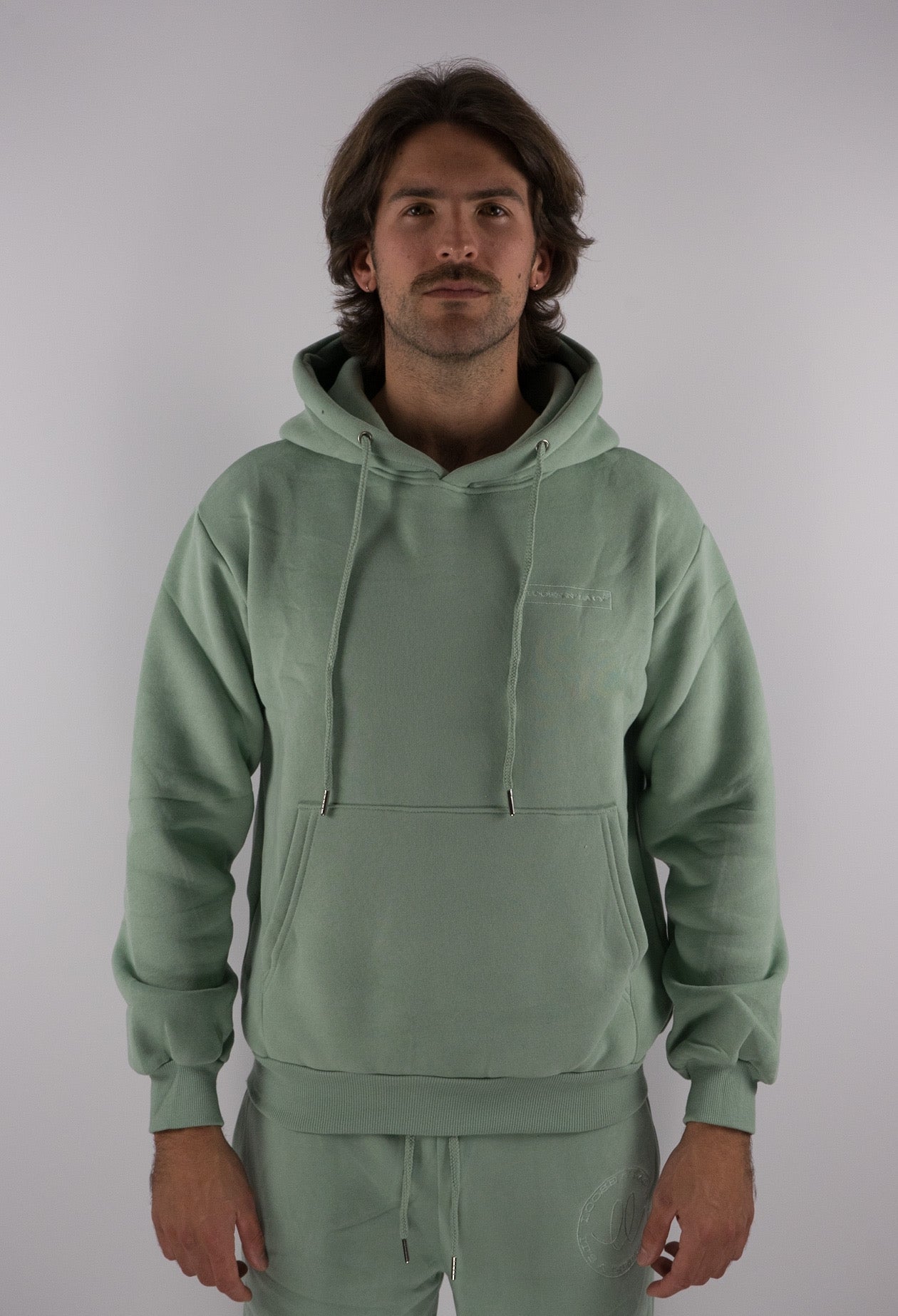 green unisex hoodie, sustainably made and soft